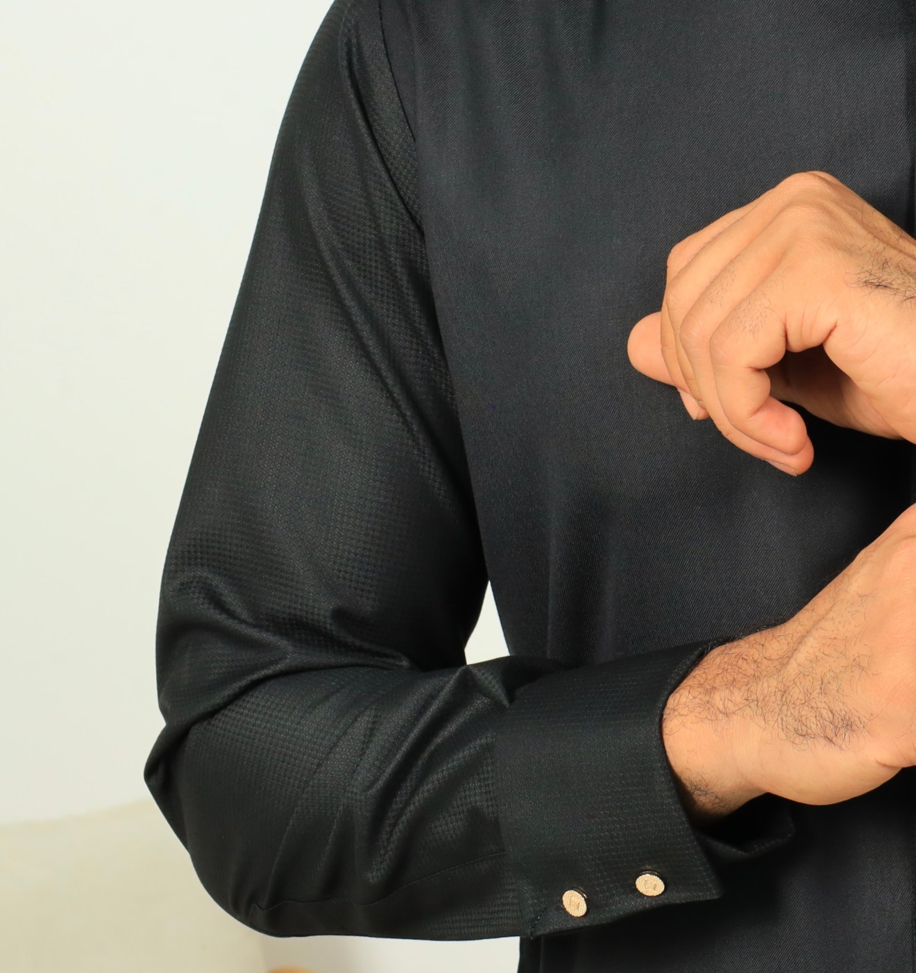 a man wearing a black shirt